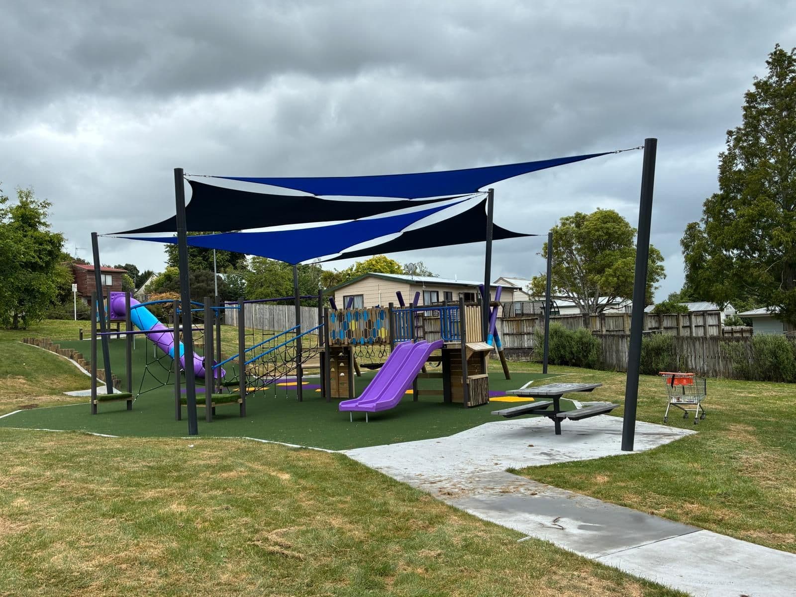 Blue shade sails installed over a school playground
