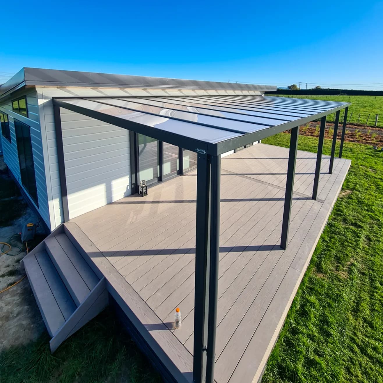 Ally-Golla aluminium and polycarbonate canopy over a timber deck