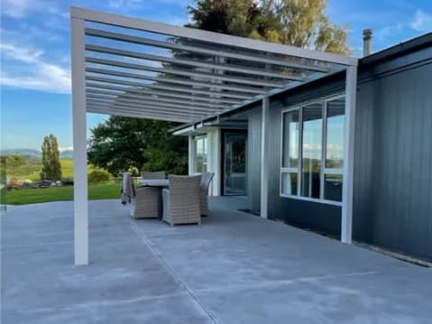 Completed Ally-Golla installation over a patio seating area