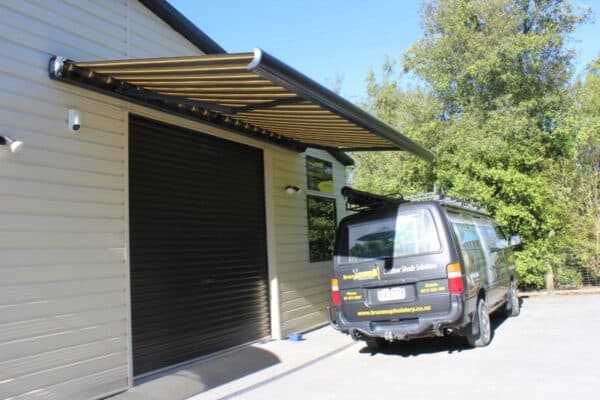 Canvas awning providing shade for a residential courtyard