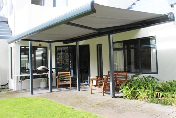 Custom awning shading windows on a family home