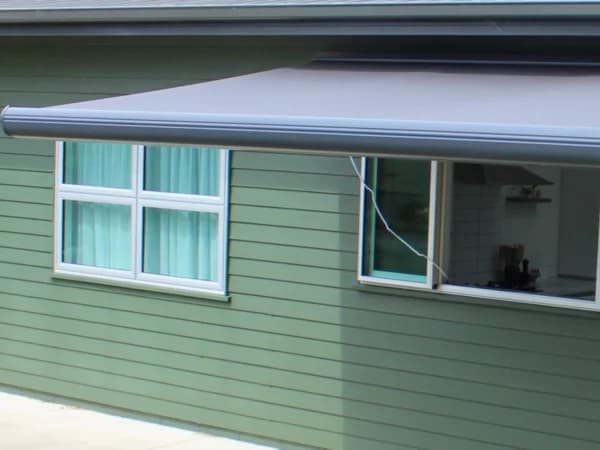 Cassette retractable awning fitted to a modern home