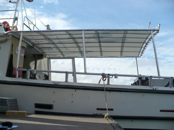 Custom-made protective cover fitted outdoors