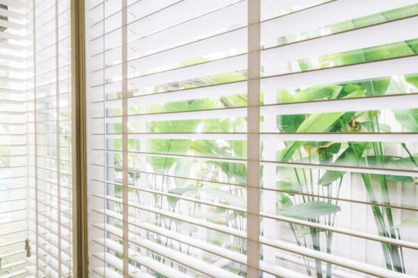 Venetian blinds on a bright window