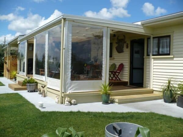 Outdoor blinds fitted to a pergola for all-weather use