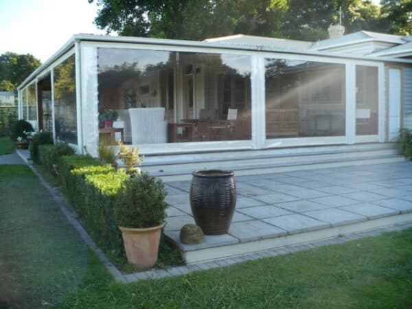 Cafe blinds protecting an alfresco area from the wind