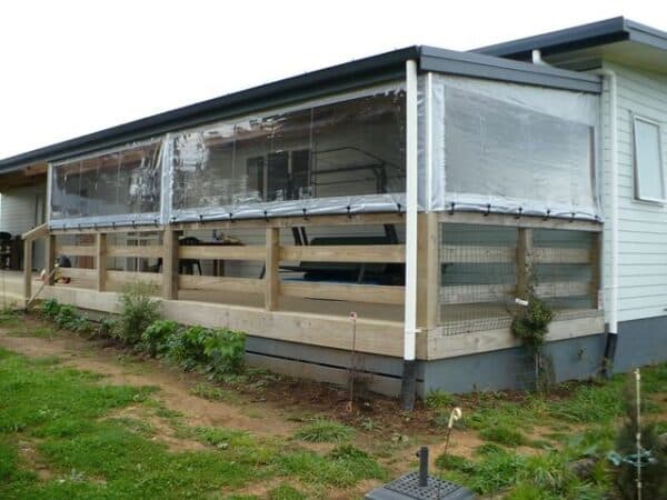 Cafe blinds shading a children's outdoor play area