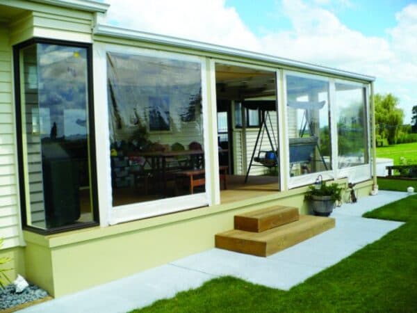 Patio curtains weather-proofing a covered deck