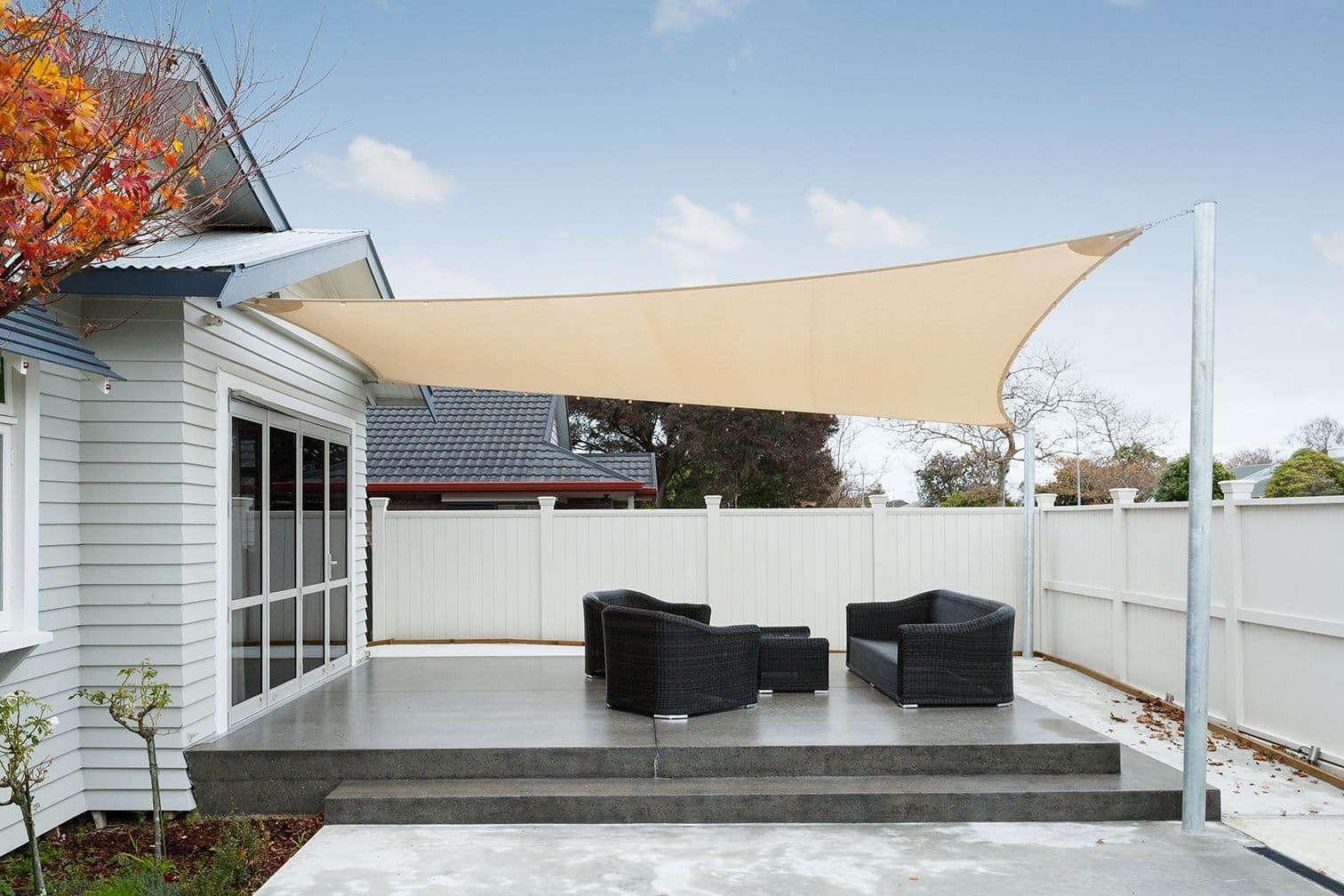 Grey Shadetex shade sail stretched over an outdoor living area