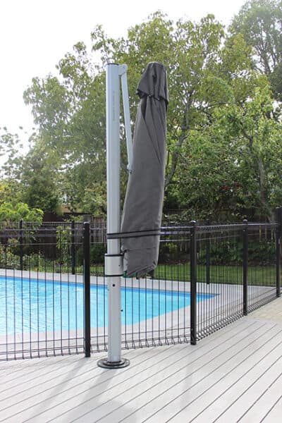 Shade7 tilting umbrella shading a compact courtyard