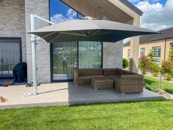 Shade7 umbrella installation over an outdoor table