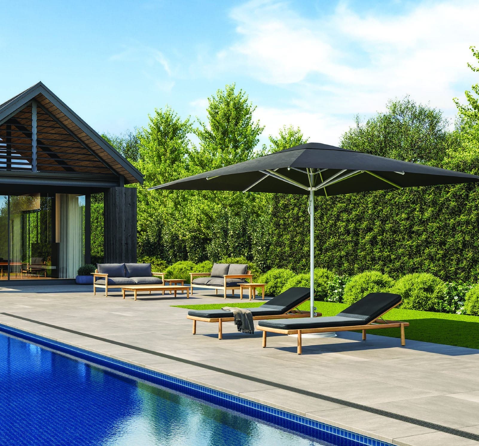 Charcoal Shade7 Alfresco umbrella over poolside loungers