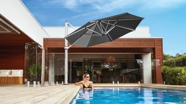 Charcoal grey Shade7 Riviera cantilever umbrella over a deck