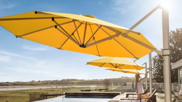 Yellow Shade7 Riviera cantilever umbrella over outdoor seating