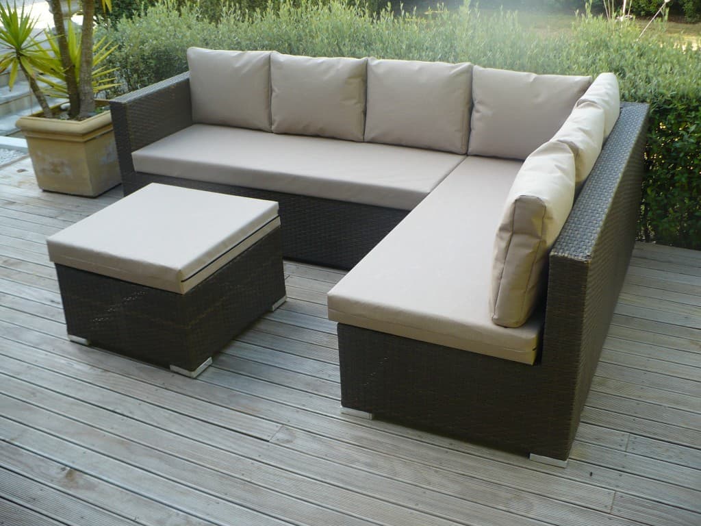 Reupholstered outdoor wicker lounge suite with cream cushions