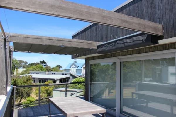 Wave shade providing sun protection for a Waikato deck