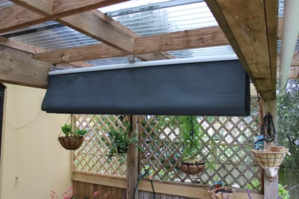 Wave shade installed over a courtyard entertaining space