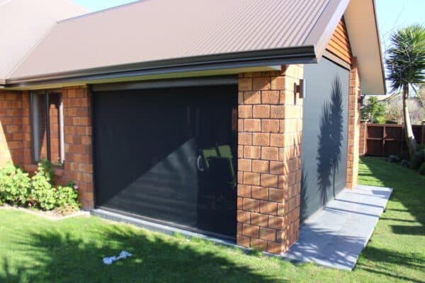 Mesh Ziptrak blinds on a commercial outdoor seating area